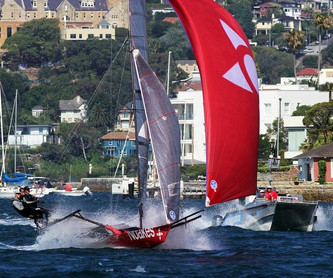 Race 1 – The video team give viewers a close up look at second-placed Noakesailing on the run to the finish – 18ft Skiffs NSW Championship ©  Frank Quealey / Australian 18 Footers League